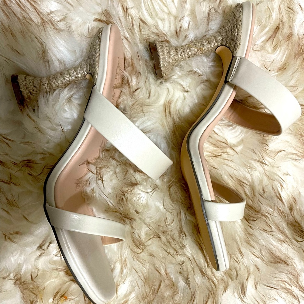Sandals are brand, cream white, fits a size 10 better